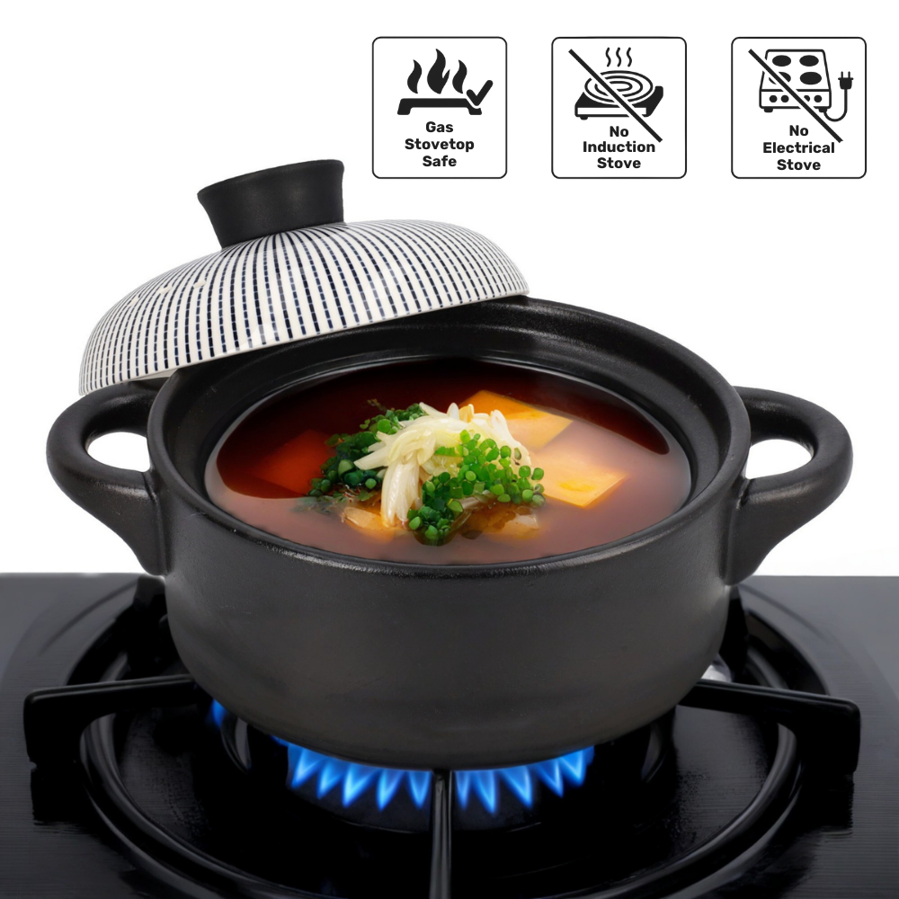 Black ceramic pot with food on a gas stove, featuring safety icons.