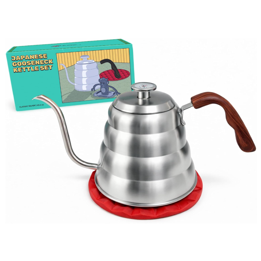 Stainless steel gooseneck kettle with wooden handle on a red trivet, next to a product box.